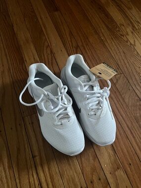 Nike White Sneakers with Silver Swoosh - Women